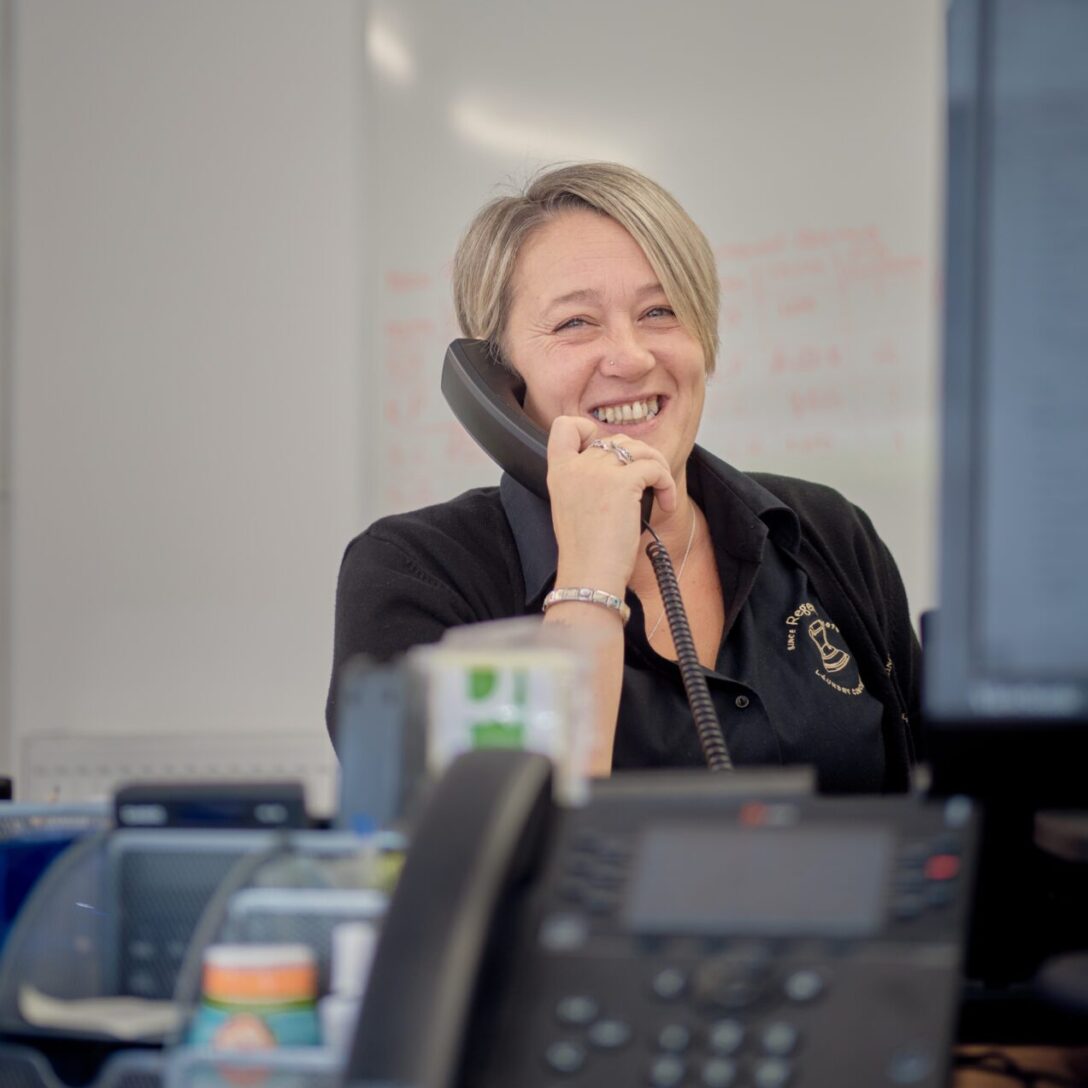 team member helping customer by phone